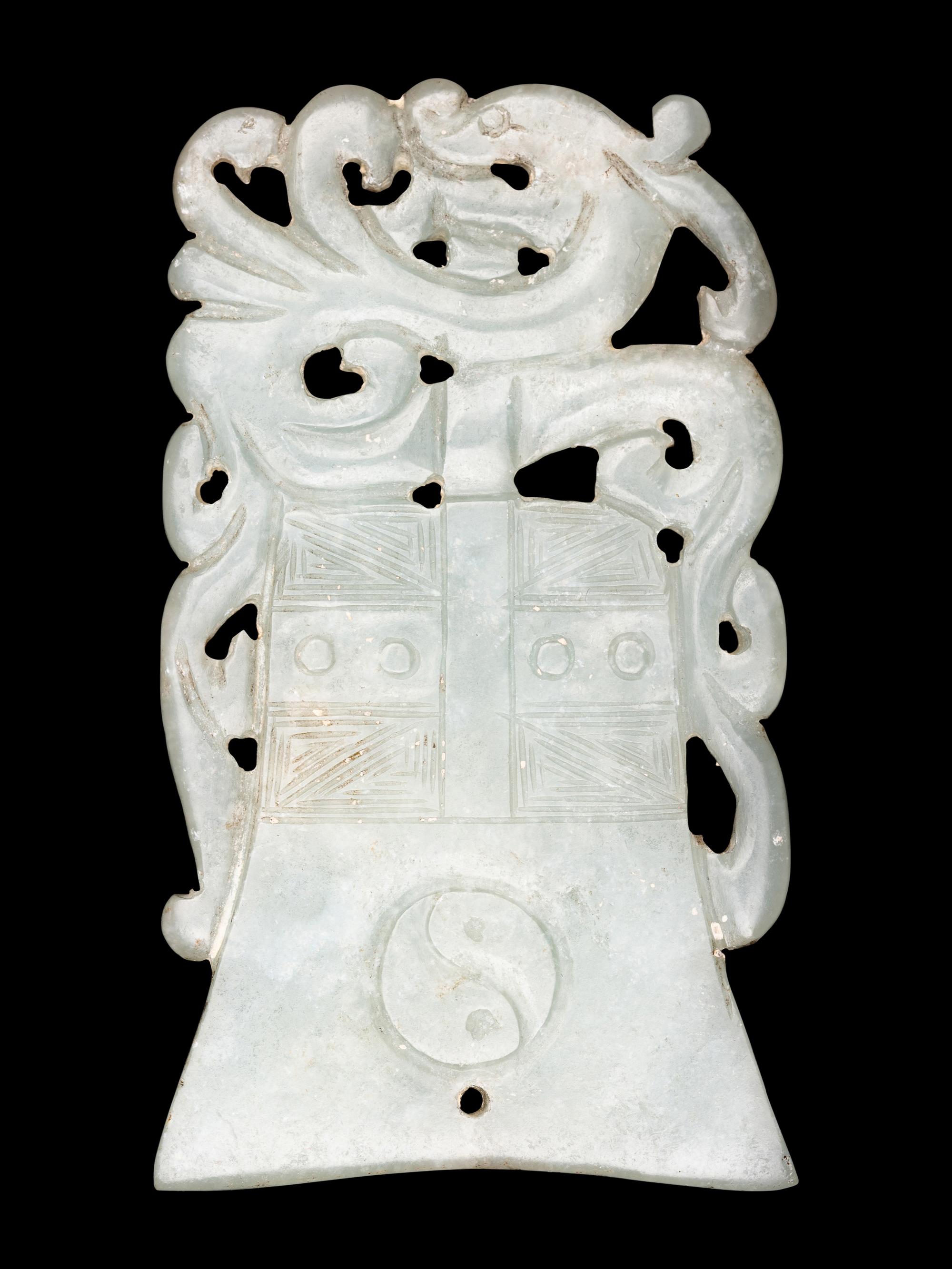 Two Celadon Jade Bell-Form Pendants