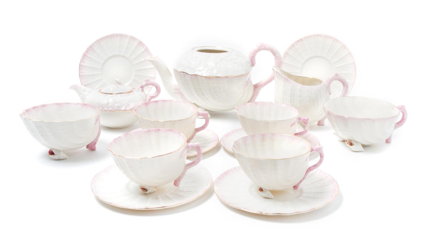 A Belleek Porcelain Neptune Tea Service Height of teapot 5 1/2 inches.