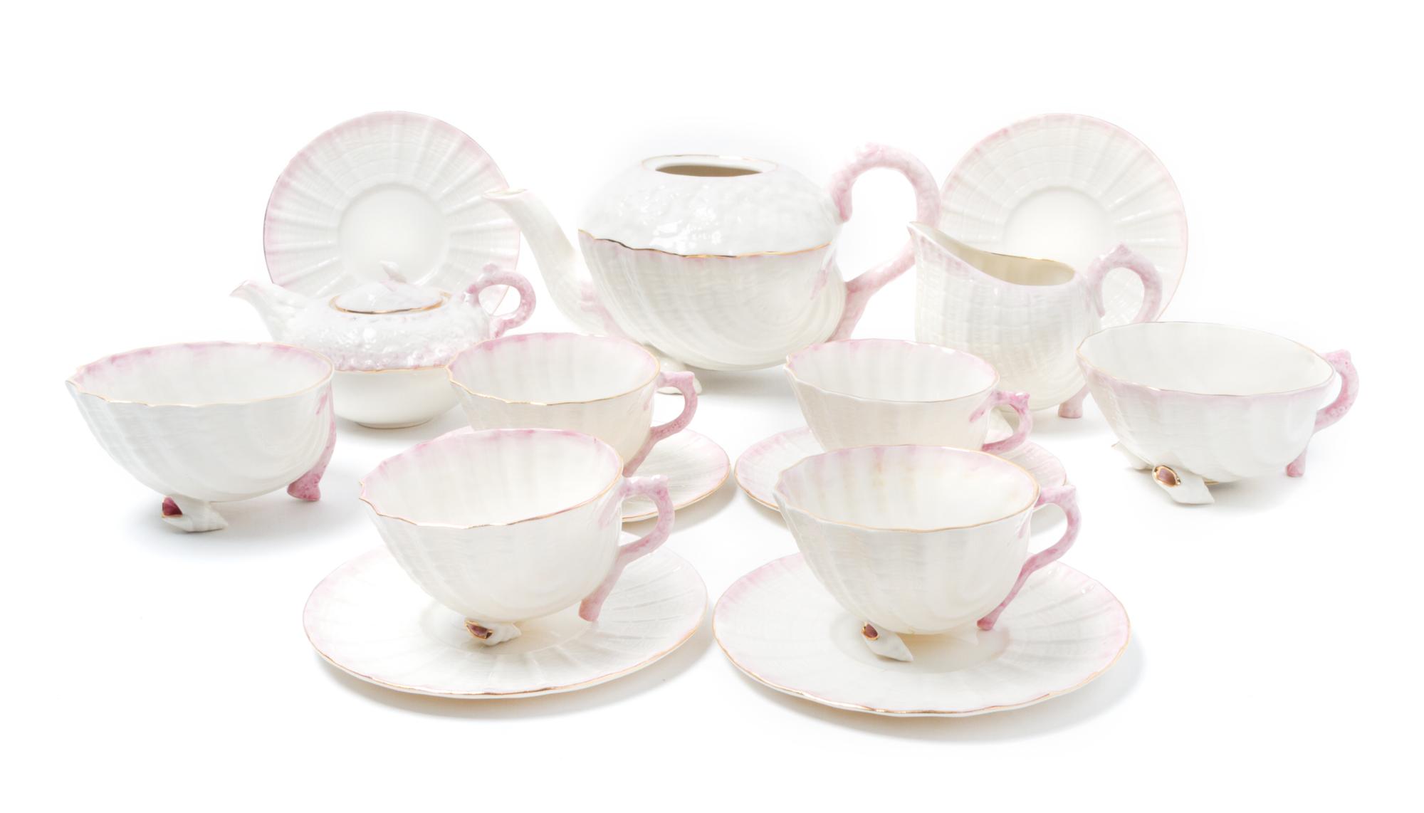 A Belleek Porcelain Neptune Tea Service Height of teapot 5 1/2 inches.