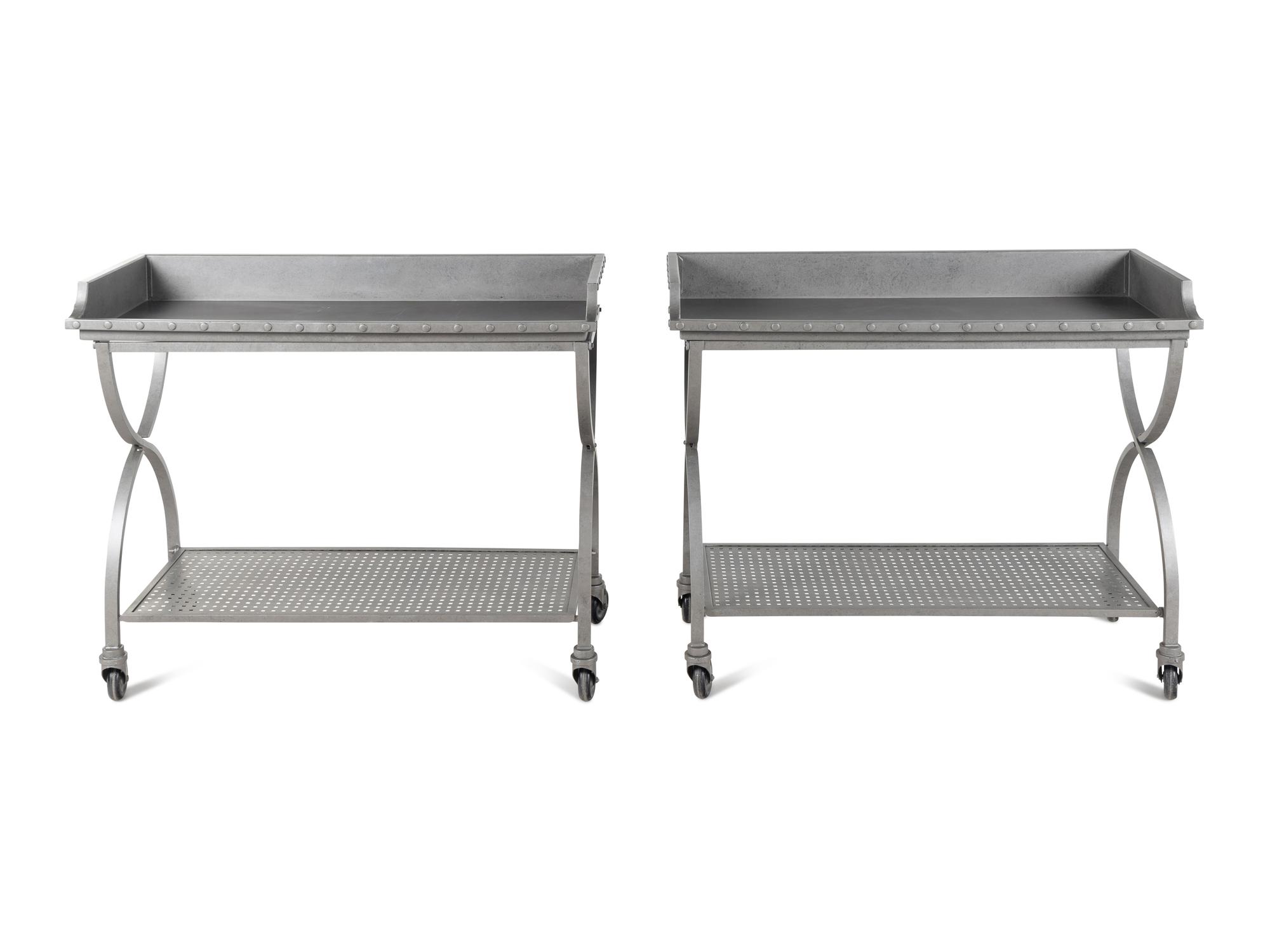 A Pair of Patinated Metal Two-Tier Serving Carts