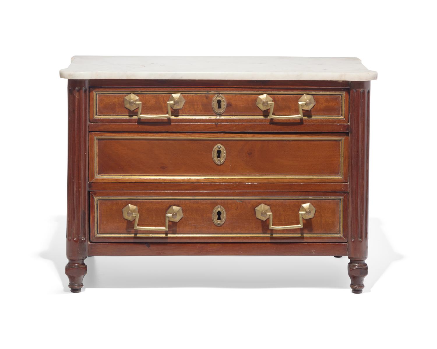 A miniature Directoire inlaid and brass-mounted mahogany commode with white marble top, circa 1800