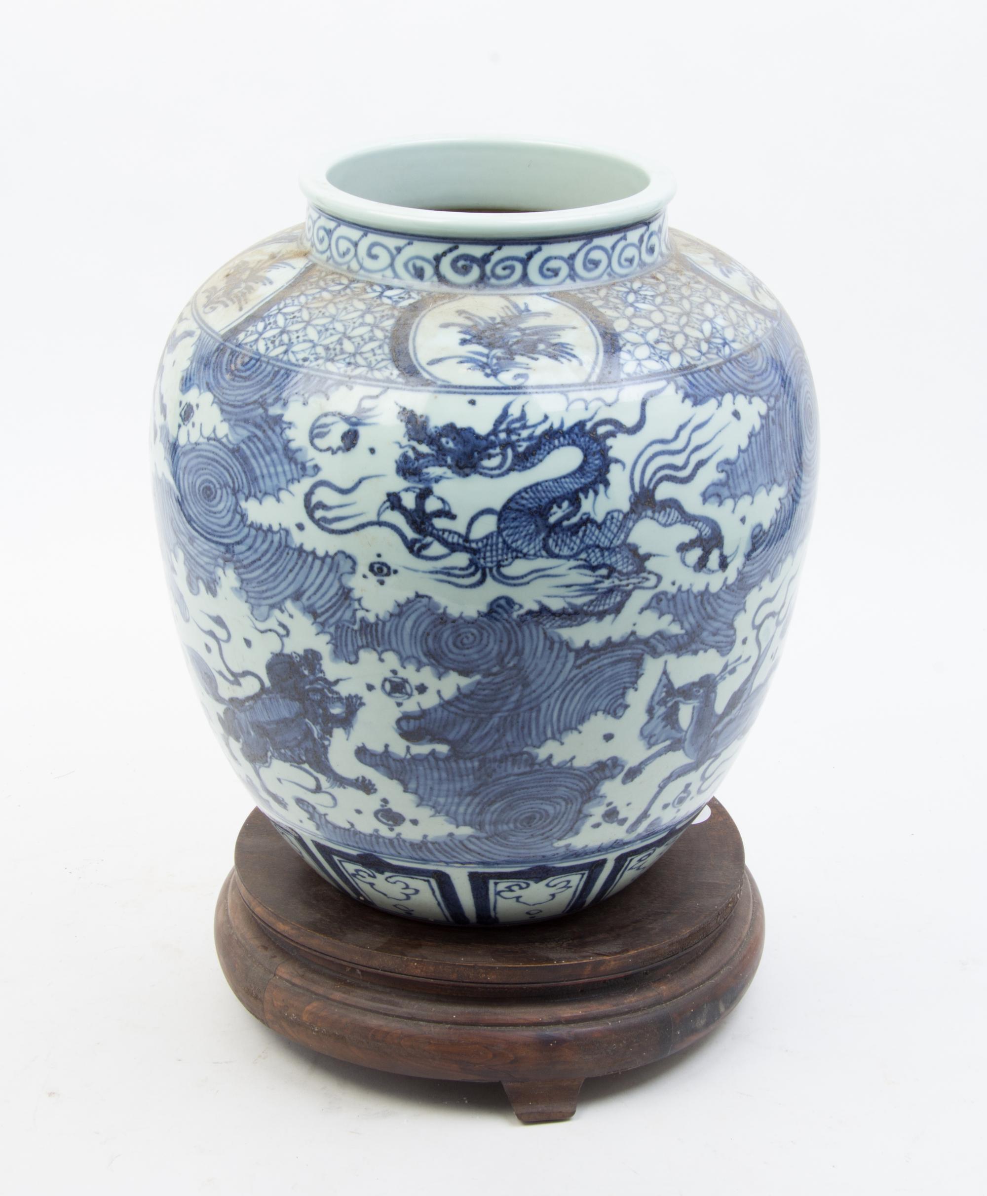 A Blue and White Porcelain Jar Height of porcelain 14 1/2 inches.