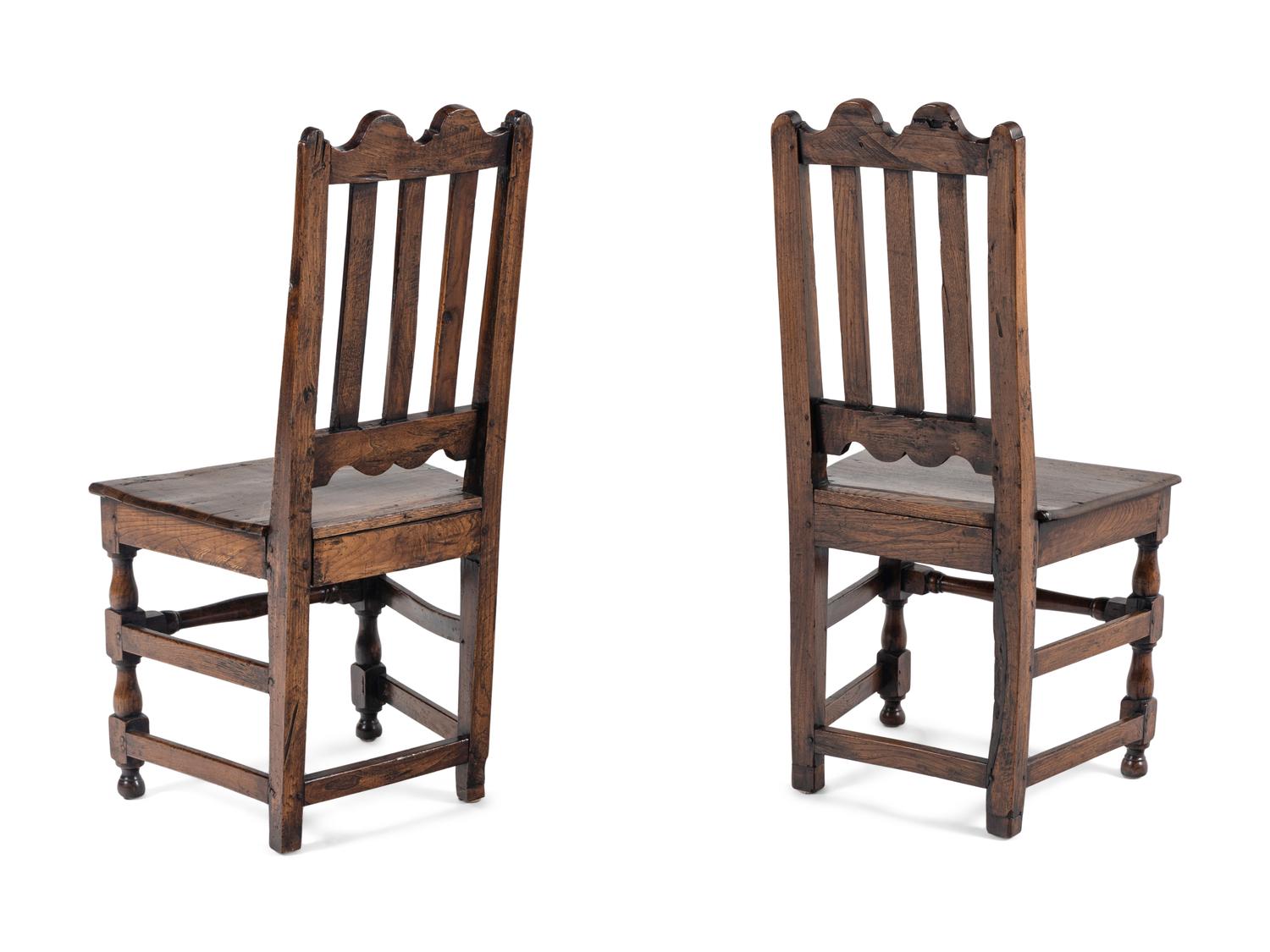 A Pair of Charles II Elm Back Stools