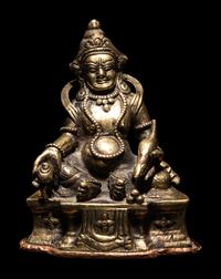 A Sino-Tibetan Bronze Figure of Jambhala