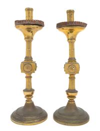 A Pair of Gothic Style Brass Prickets Height 19 inches.