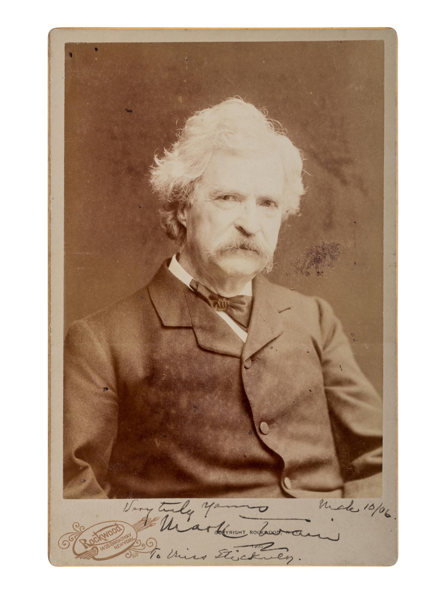 CLEMENS, Samuel Langhorne ("Mark Twain") (1835-1910). Cabinet card photograph inscribed and signed ("Mark Twain"). Rockwood, NY: Rockwood, 1905.