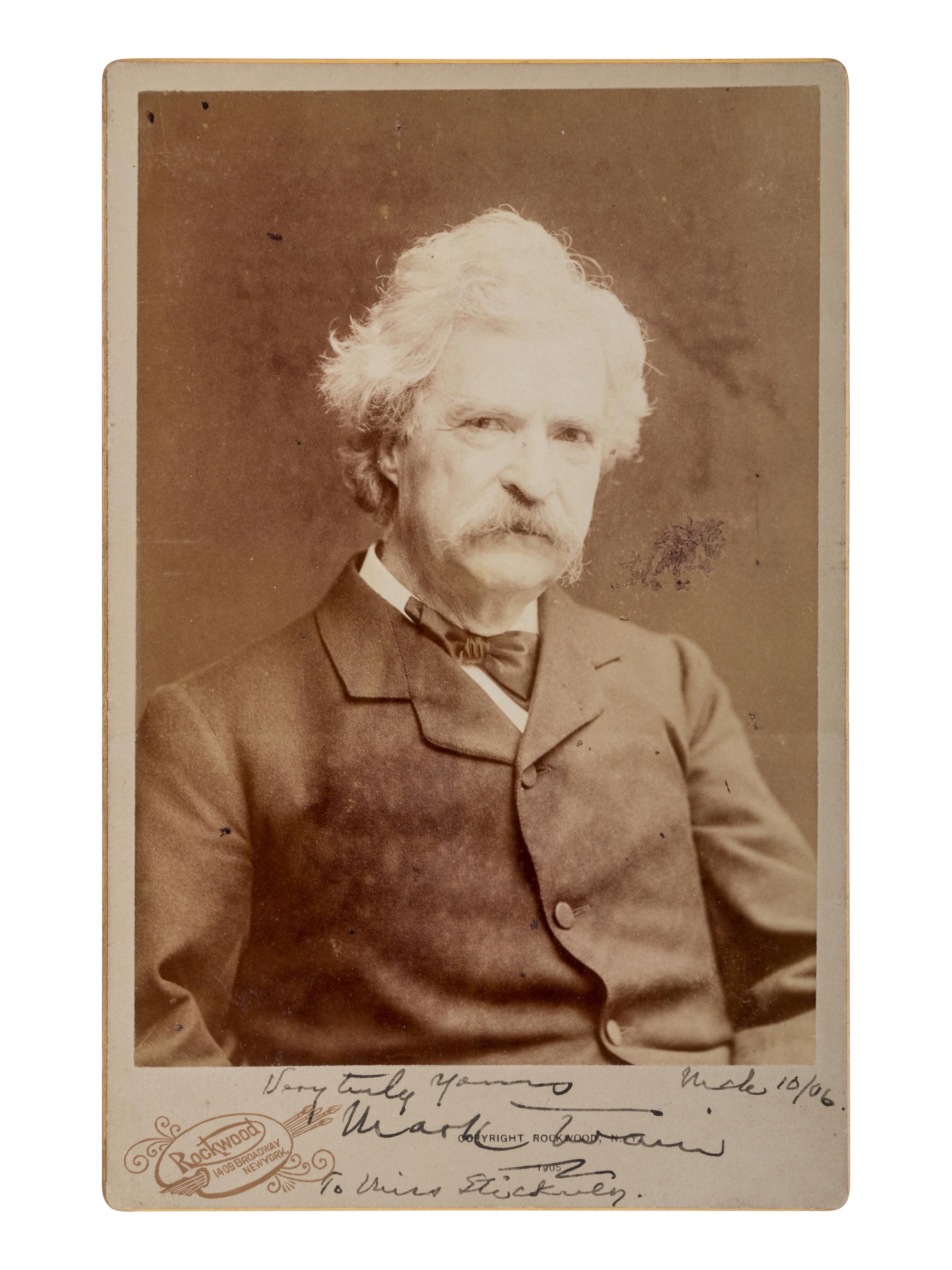 CLEMENS, Samuel Langhorne ("Mark Twain") (1835-1910). Cabinet card photograph inscribed and signed ("Mark Twain"). Rockwood, NY: Rockwood, 1905.