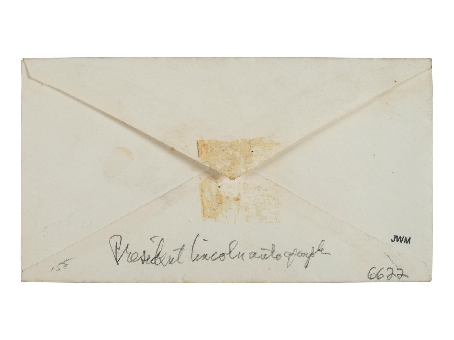 LINCOLN, Abraham (1809-1865). Autograph envelope addressed to Secretary of Navy [Gideon Welles] in Lincoln's hand.