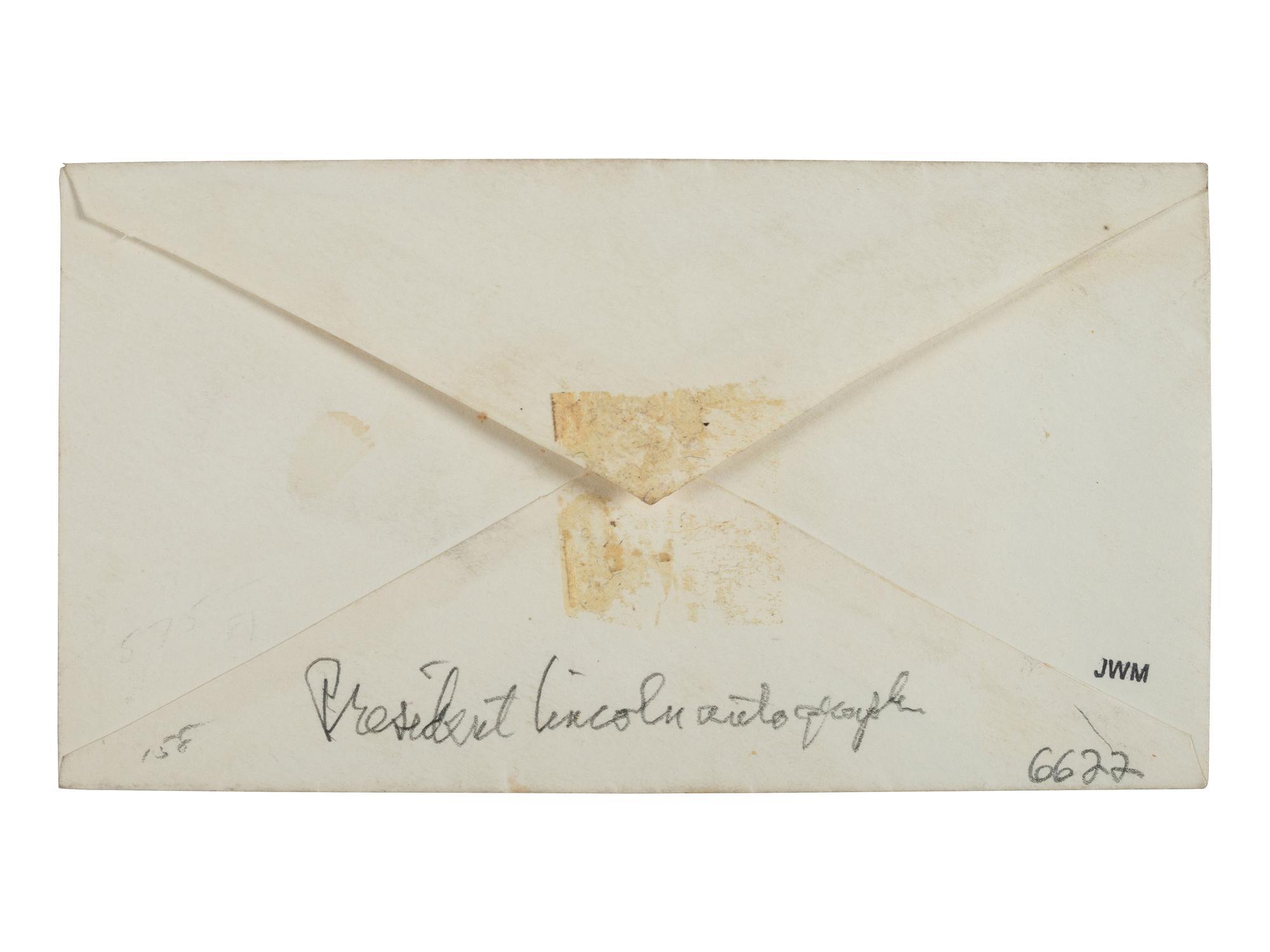 LINCOLN, Abraham (1809-1865). Autograph envelope addressed to Secretary of Navy [Gideon Welles] in Lincoln's hand.