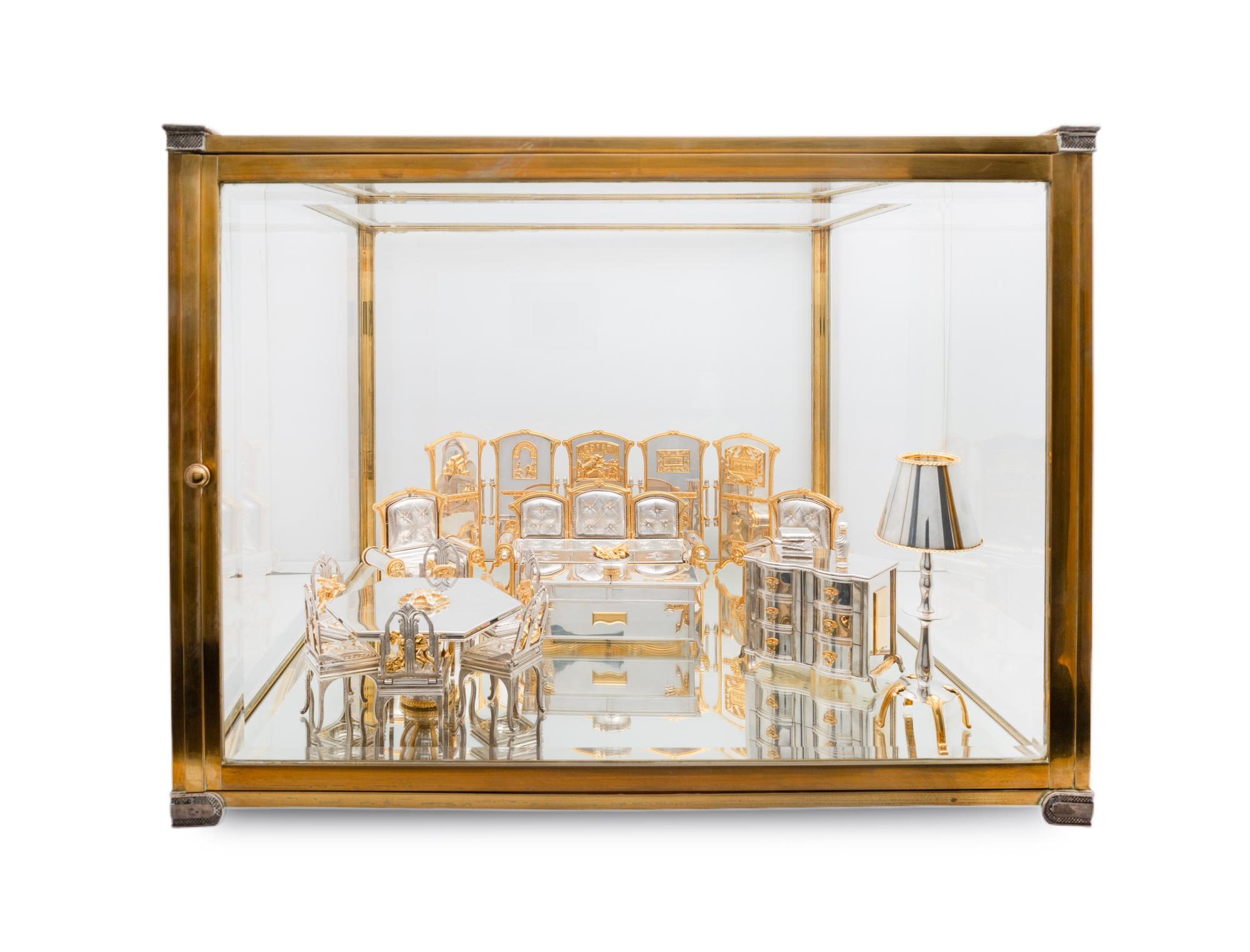 A Pair of Yossi Swed Partial Gilt Silver Armchair Shabbat Candlesticks