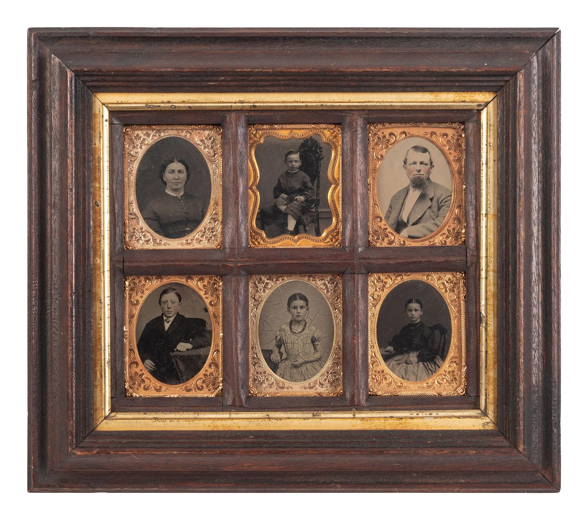 [EARLY PHOTOGRAPHY]. Ivorytype of an aged couple & wall frame containing 6 tintypes of a family.