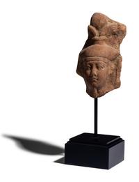 An Egyptian Terracotta Head of the God Osiris