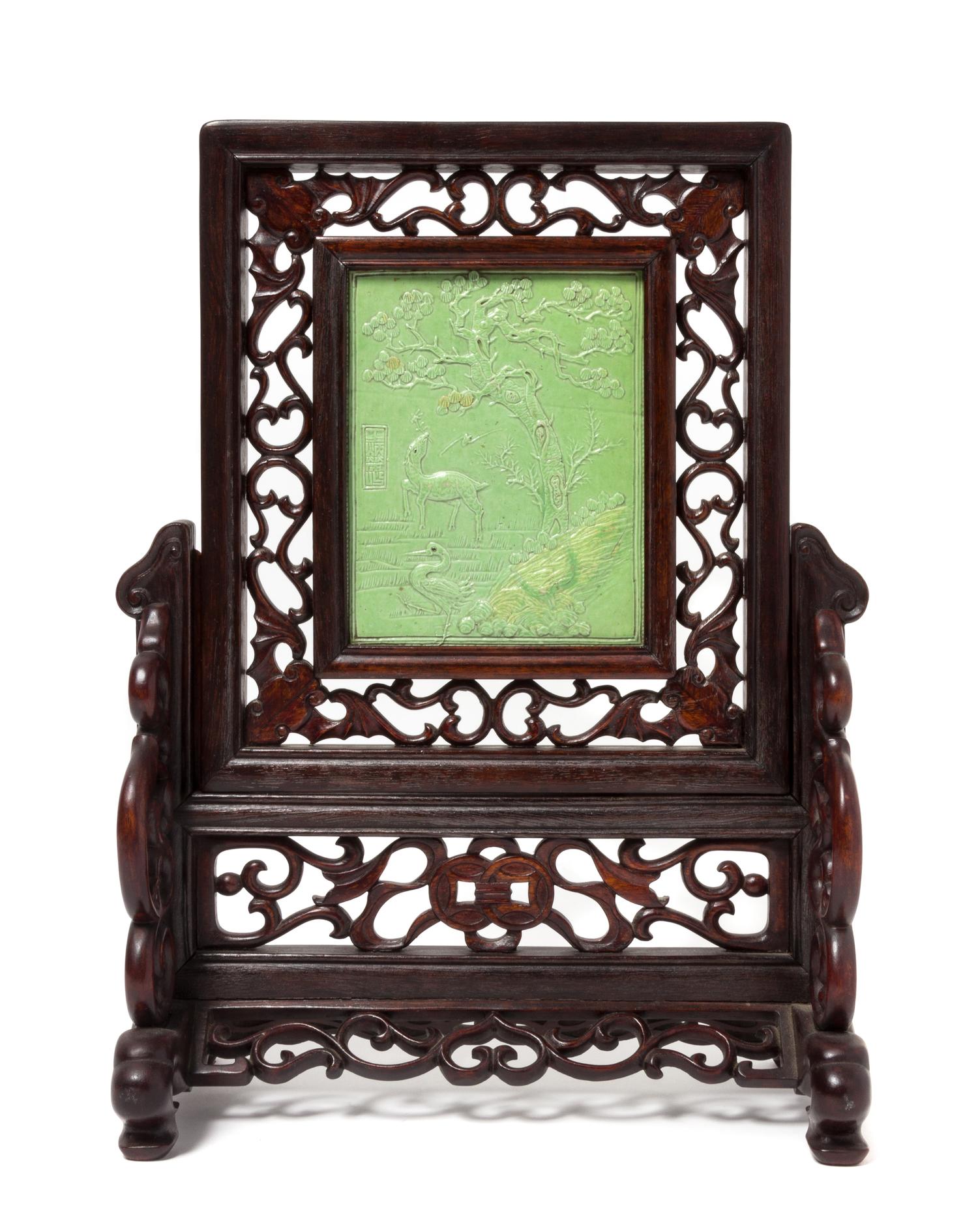A Green Glazed Porcelain Inset Hardwood Table Screen Height 6 3/8 x width 5 inches.