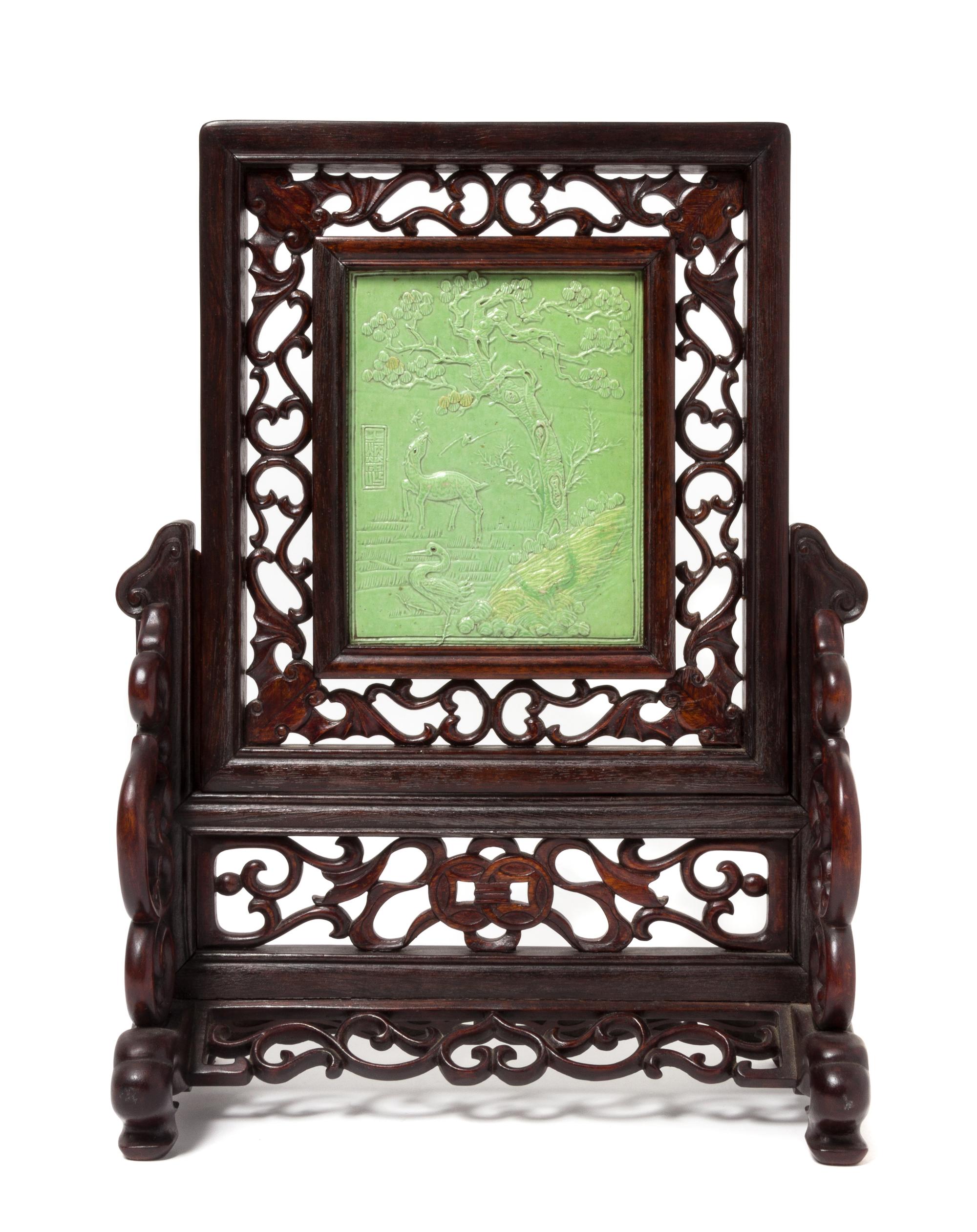 A Green Glazed Porcelain Inset Hardwood Table Screen Height 6 3/8 x width 5 inches.