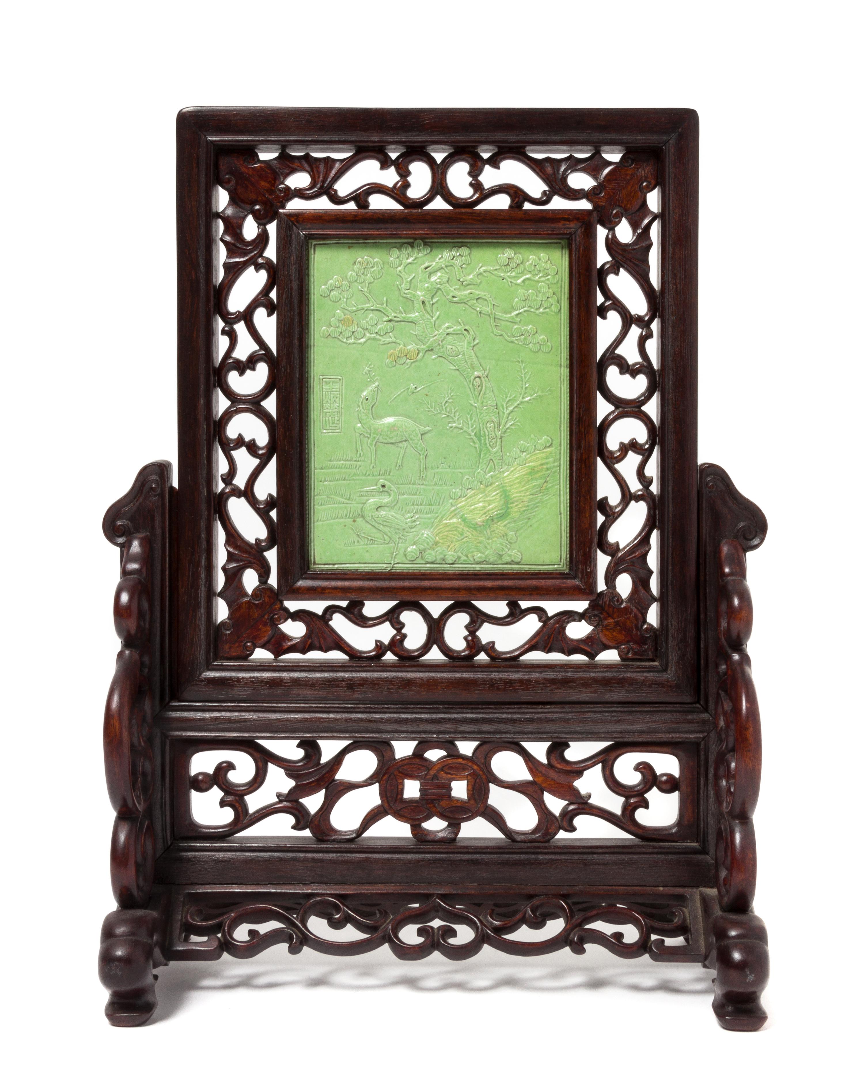 A Green Glazed Porcelain Inset Hardwood Table Screen Height 6 3/8 x width 5 inches.
