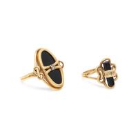 COLLECTION OF YELLOW GOLD AND BLACK ONYX RINGS
