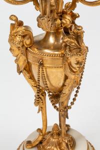 A Pair of Louis XVI Style Gilt Bronze and Marble Seven-Light Candelabra