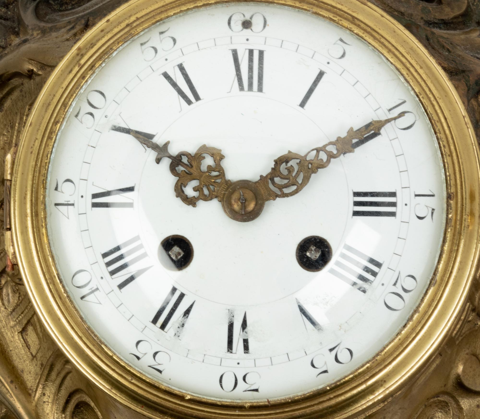 A Napoleon III Style Gilt Bronze Cartel Clock