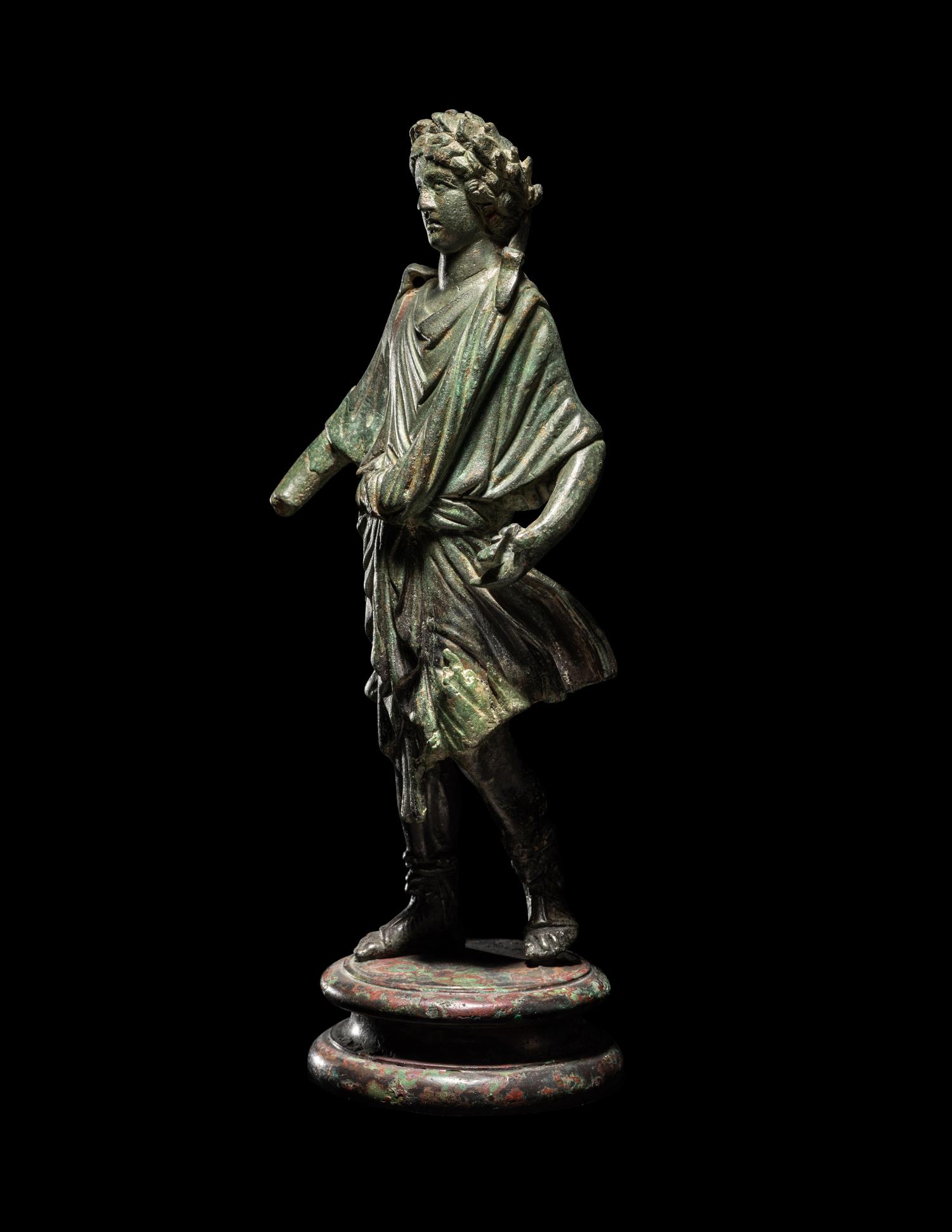 A Roman Bronze Lar with Copper Inlay