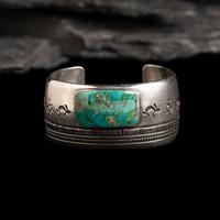 Norbert Peshlakai (Diné, b. 1953) — Silver and Turquoise Cuff Bracelet, with Rabbits