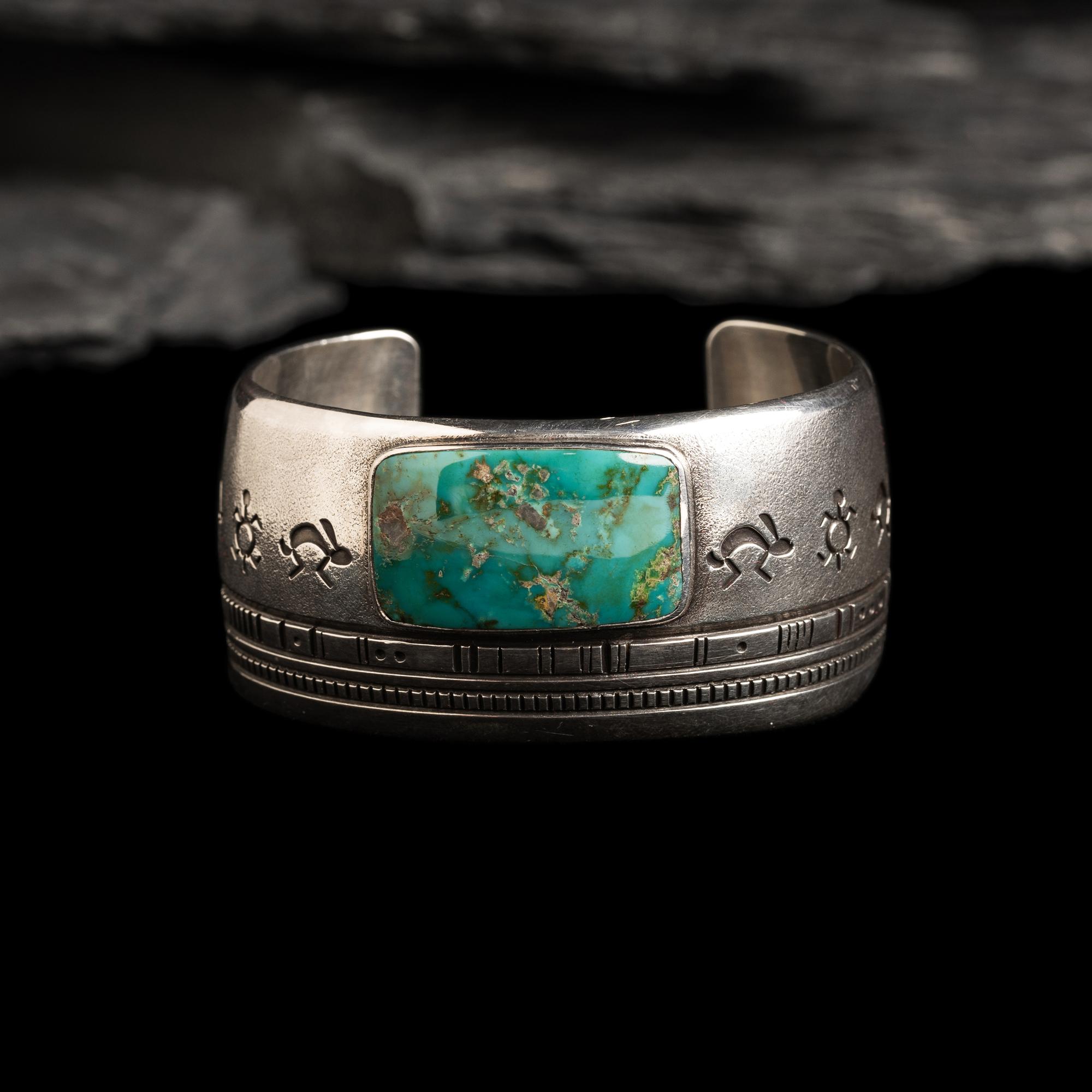 Norbert Peshlakai (Diné, b. 1953) — Silver and Turquoise Cuff Bracelet, with Rabbits