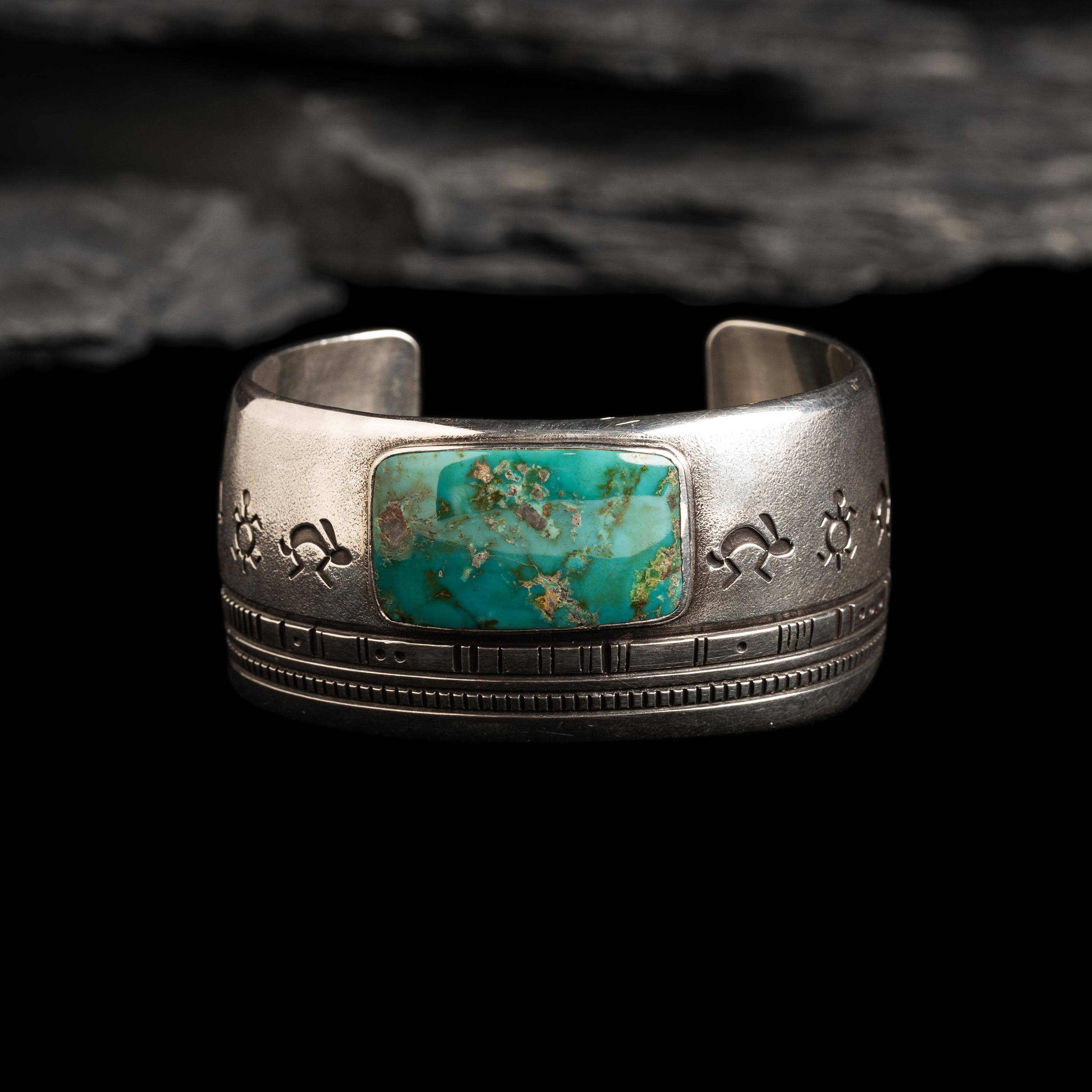 Norbert Peshlakai (Diné, b. 1953) — Silver and Turquoise Cuff Bracelet, with Rabbits