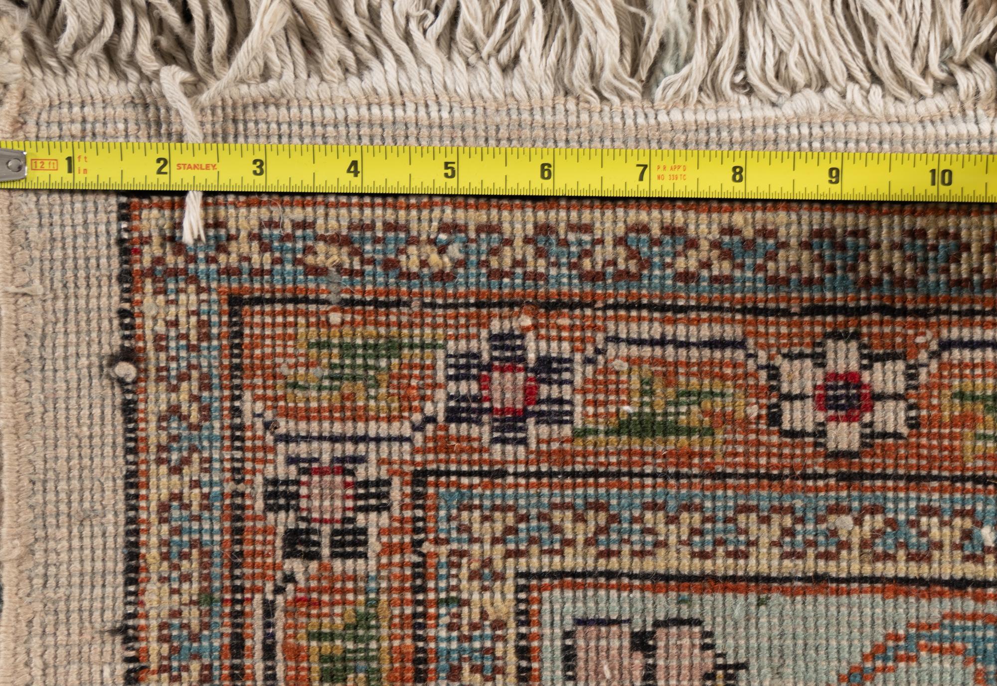 A Tabriz Wool Rug