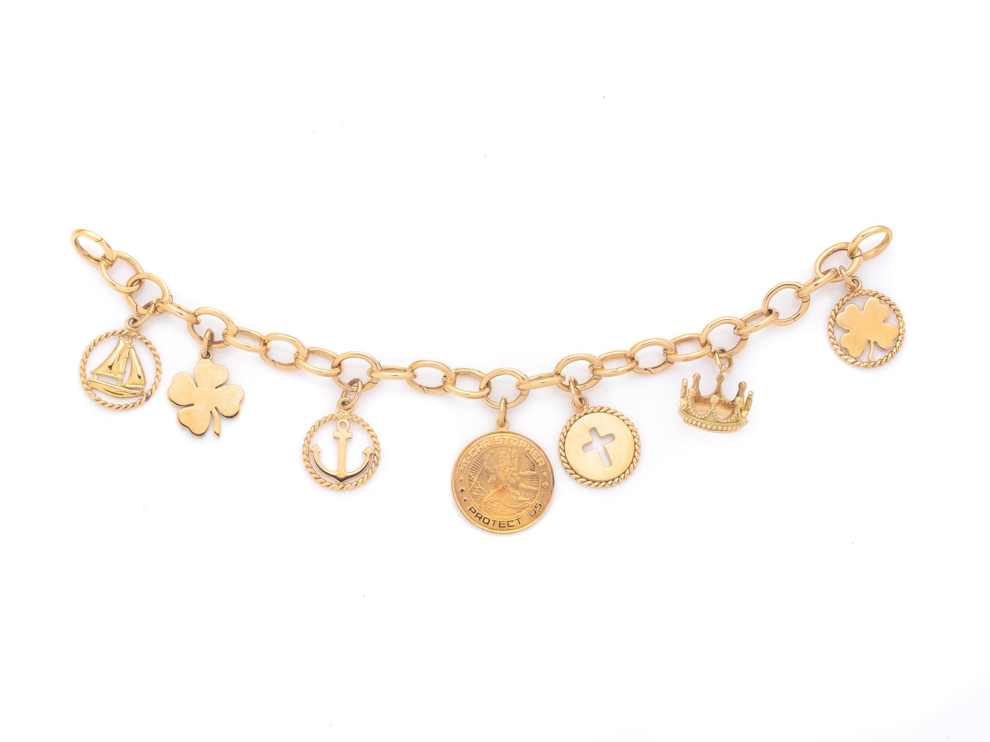 TIFFANY & CO., YELLOW GOLD CHARM BRACELET