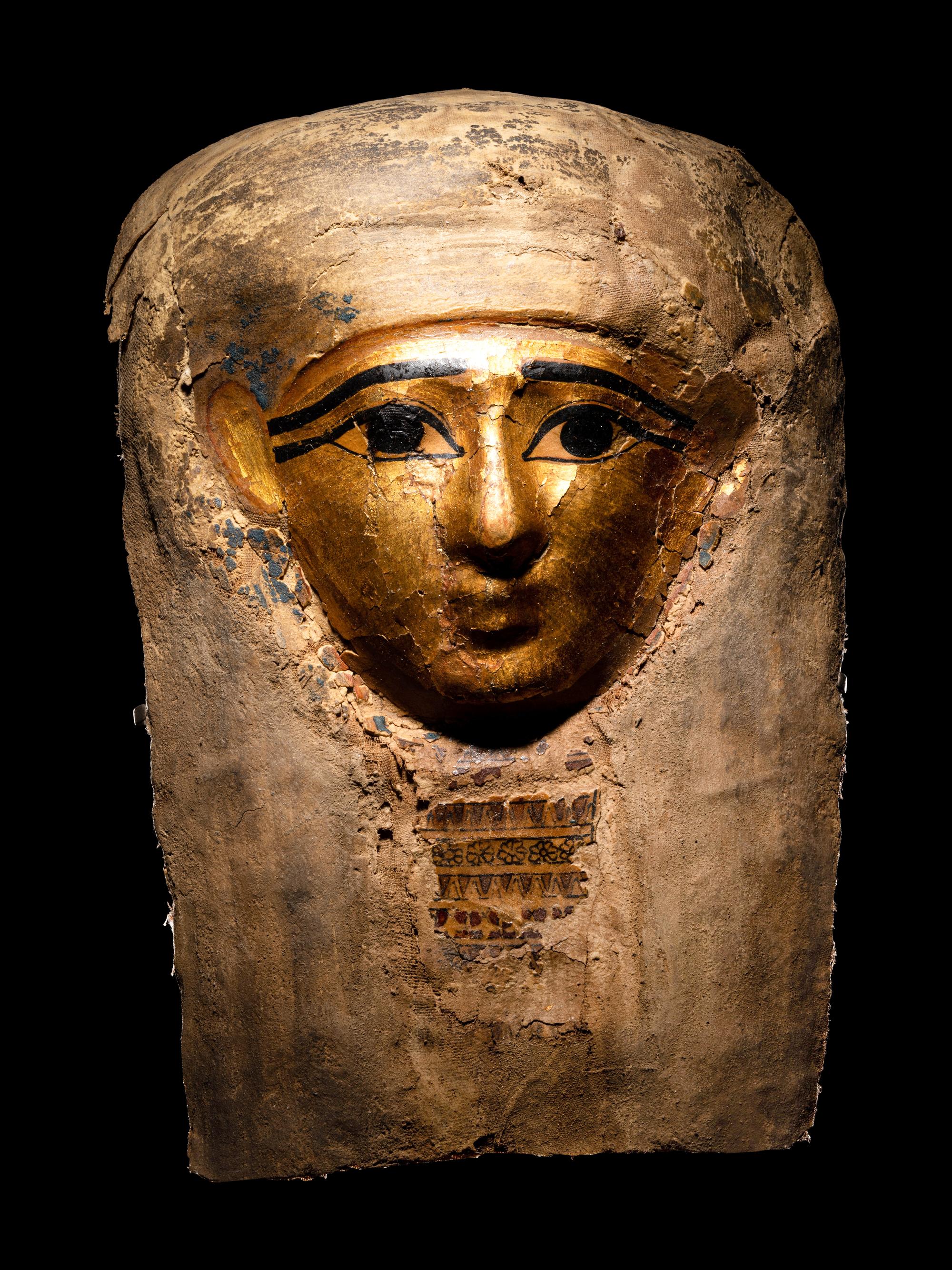 An Egyptian Cartonnage Mummy Mask