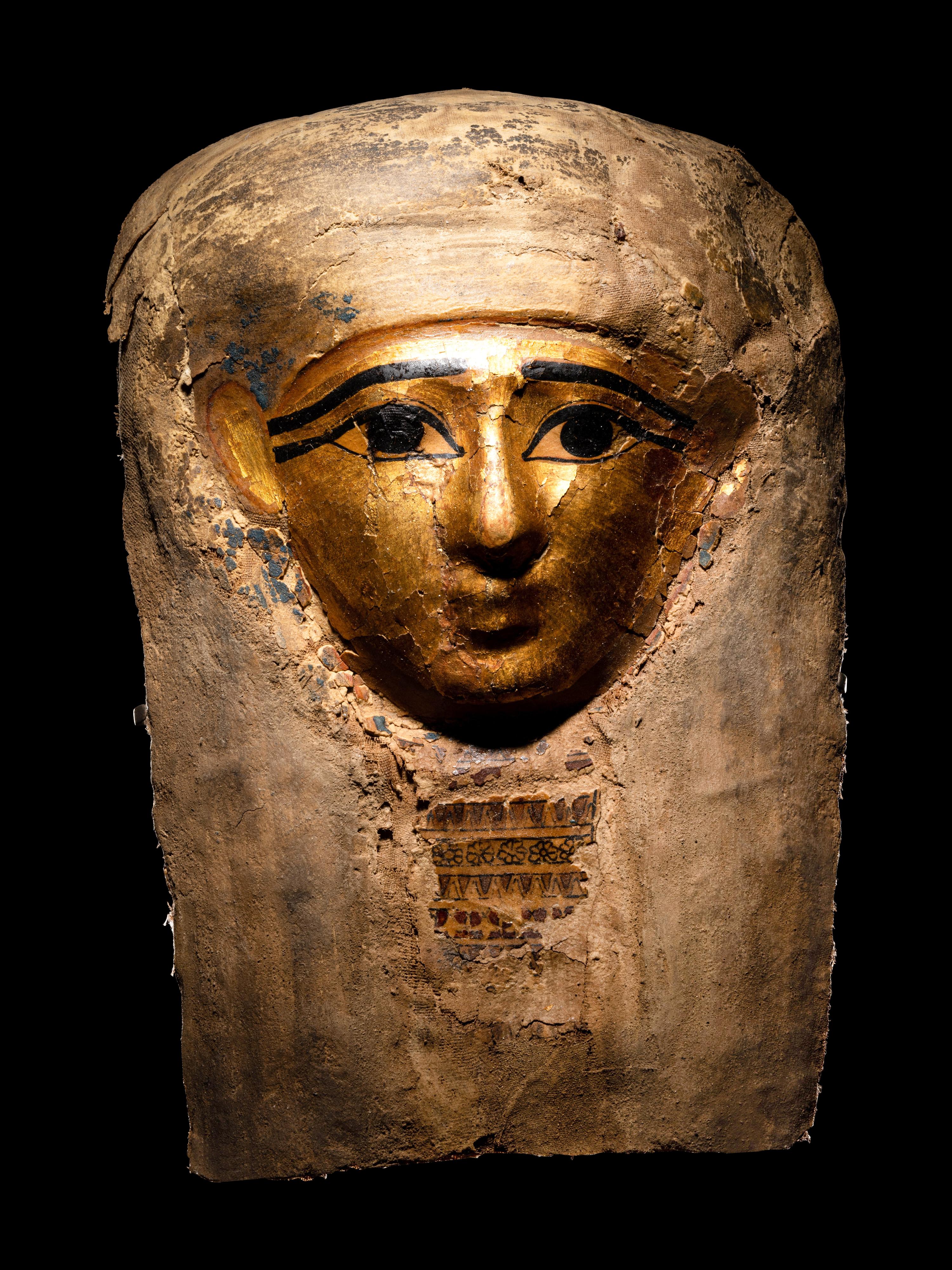 An Egyptian Cartonnage Mummy Mask