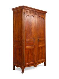 A French Provincial Carved Walnut Armoire