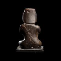 A Group of Twelve Pre-Colombian Style and Near Eastern Style Carved Stone Articles