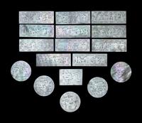 Seventeen Carved Mother-of-Pearl Game Pieces