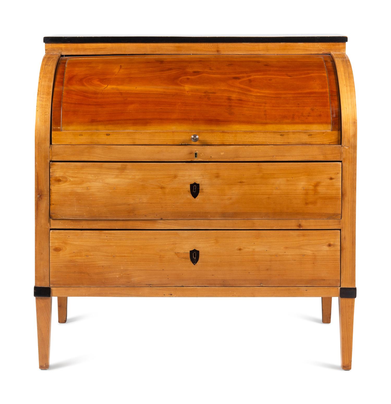 A Biedermeier Part-Ebonized Birch Cylinder Bureau