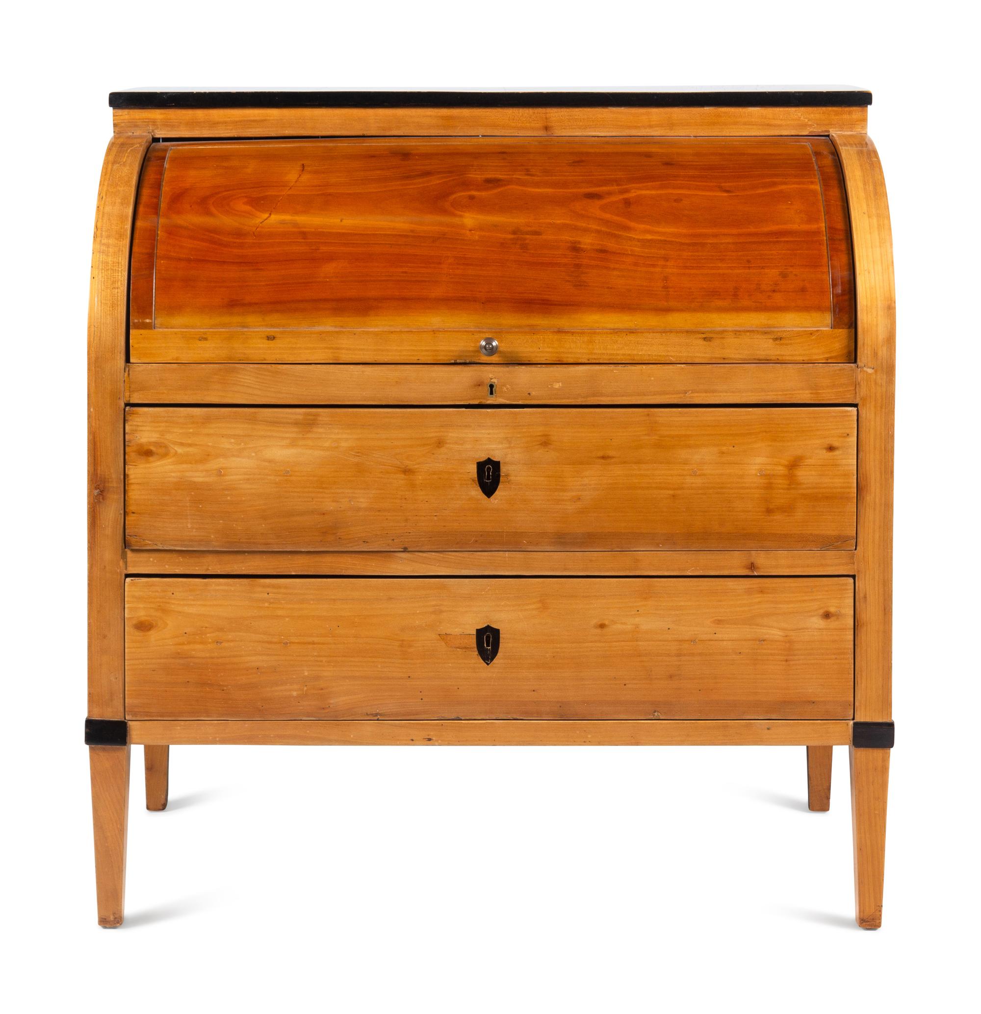 A Biedermeier Part-Ebonized Birch Cylinder Bureau