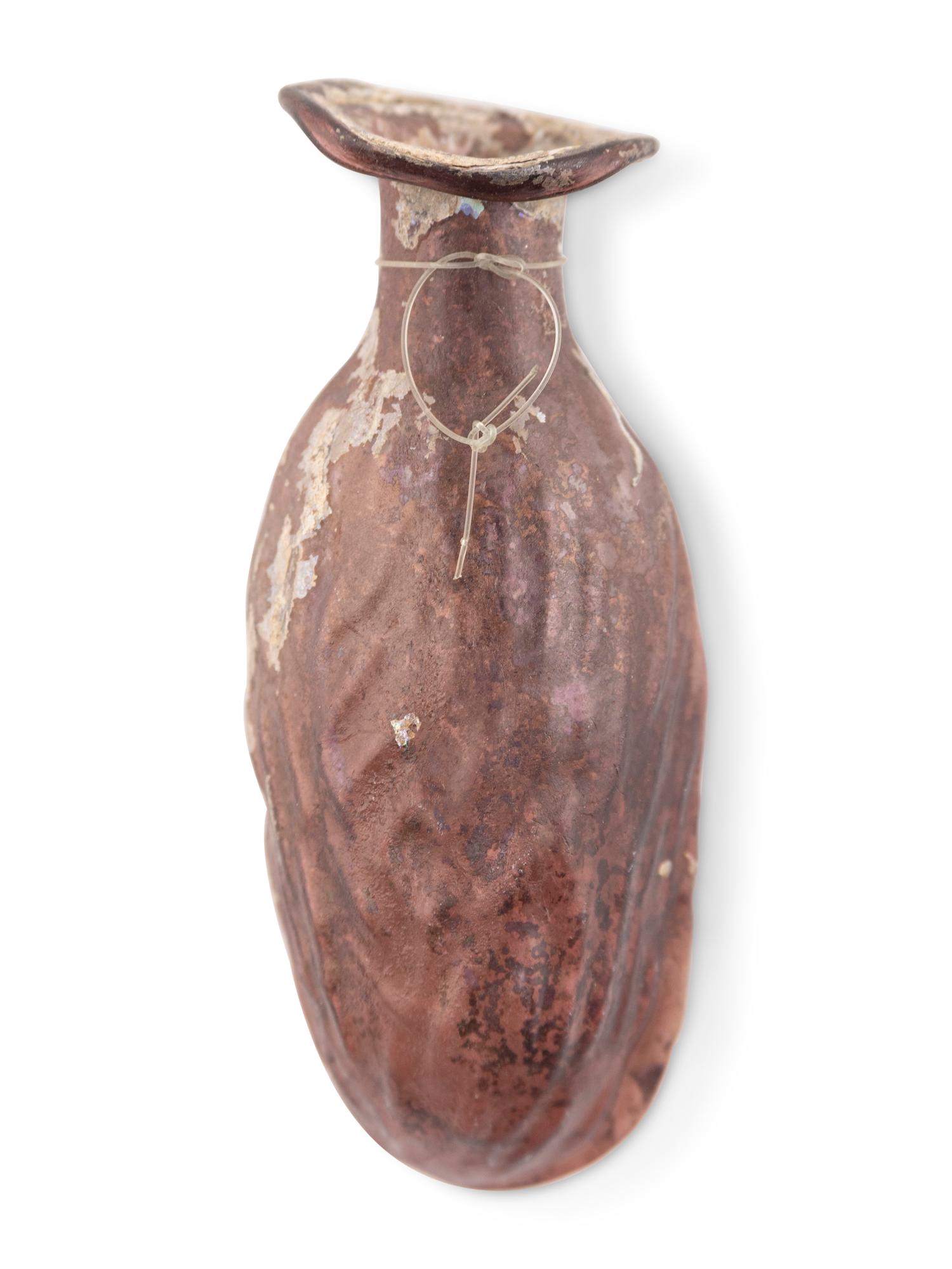 A Roman Amber Glass Date Flask