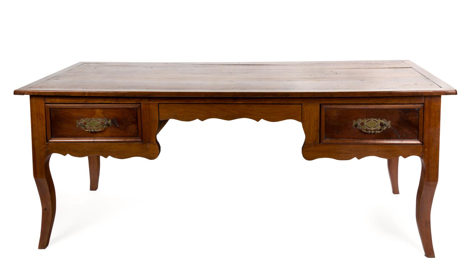A French Provincial Fruitwood Writing Table Height 30 x width 70 x depth 28 1/2 inches. — PROBABLY 19TH CENTURY