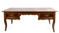 A French Provincial Fruitwood Writing Table Height 30 x width 70 x depth 28 1/2 inches. — PROBABLY 19TH CENTURY