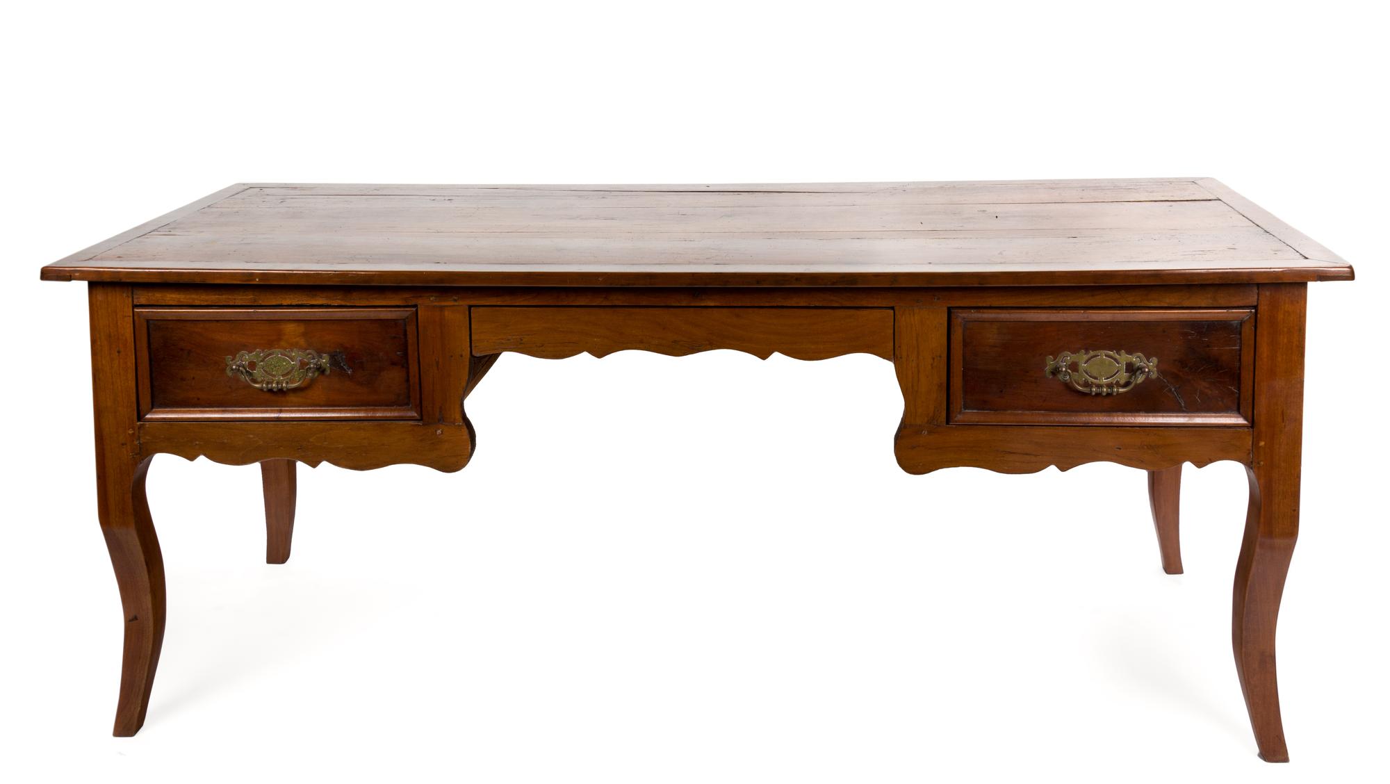 A French Provincial Fruitwood Writing Table Height 30 x width 70 x depth 28 1/2 inches. — PROBABLY 19TH CENTURY