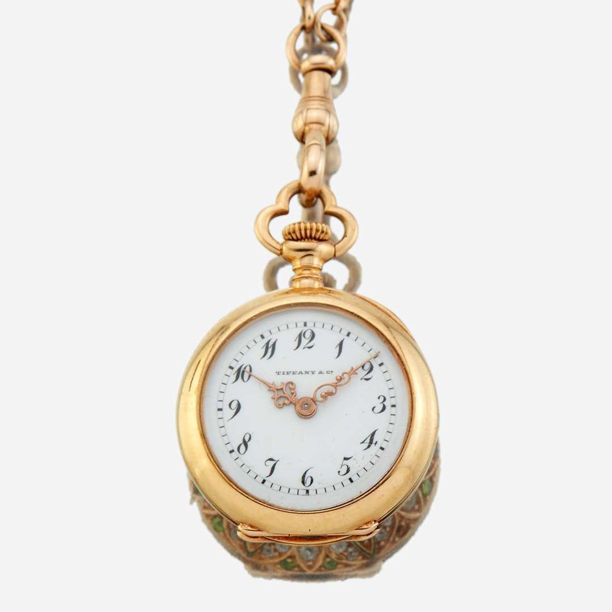 A lady's diamond and tsavorite garnet openface pocket watch necklace, Tiffany & Company