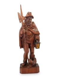 A Black Forest Carved Walnut 'Night Watchman' Lamp