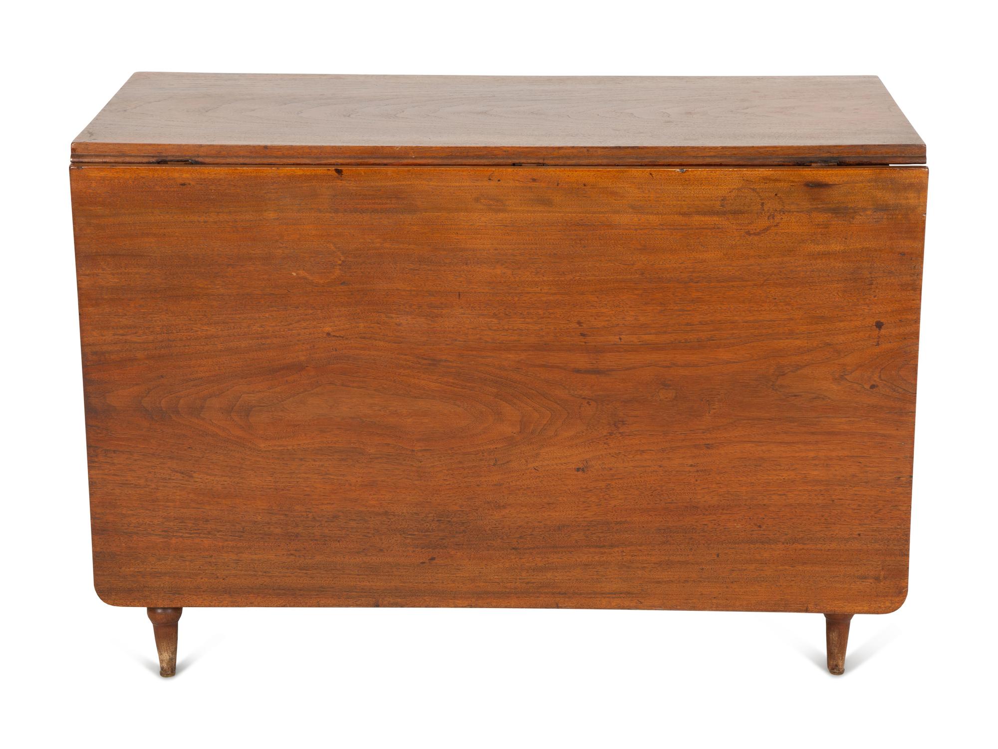 An American Mahogany Drop Leaf Dining Table