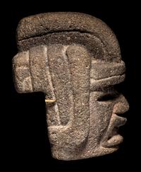 A Veracruz Stone Hacha in the Form of a Warrior