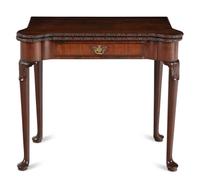 A George III Carved Mahogany Flip-Top Table