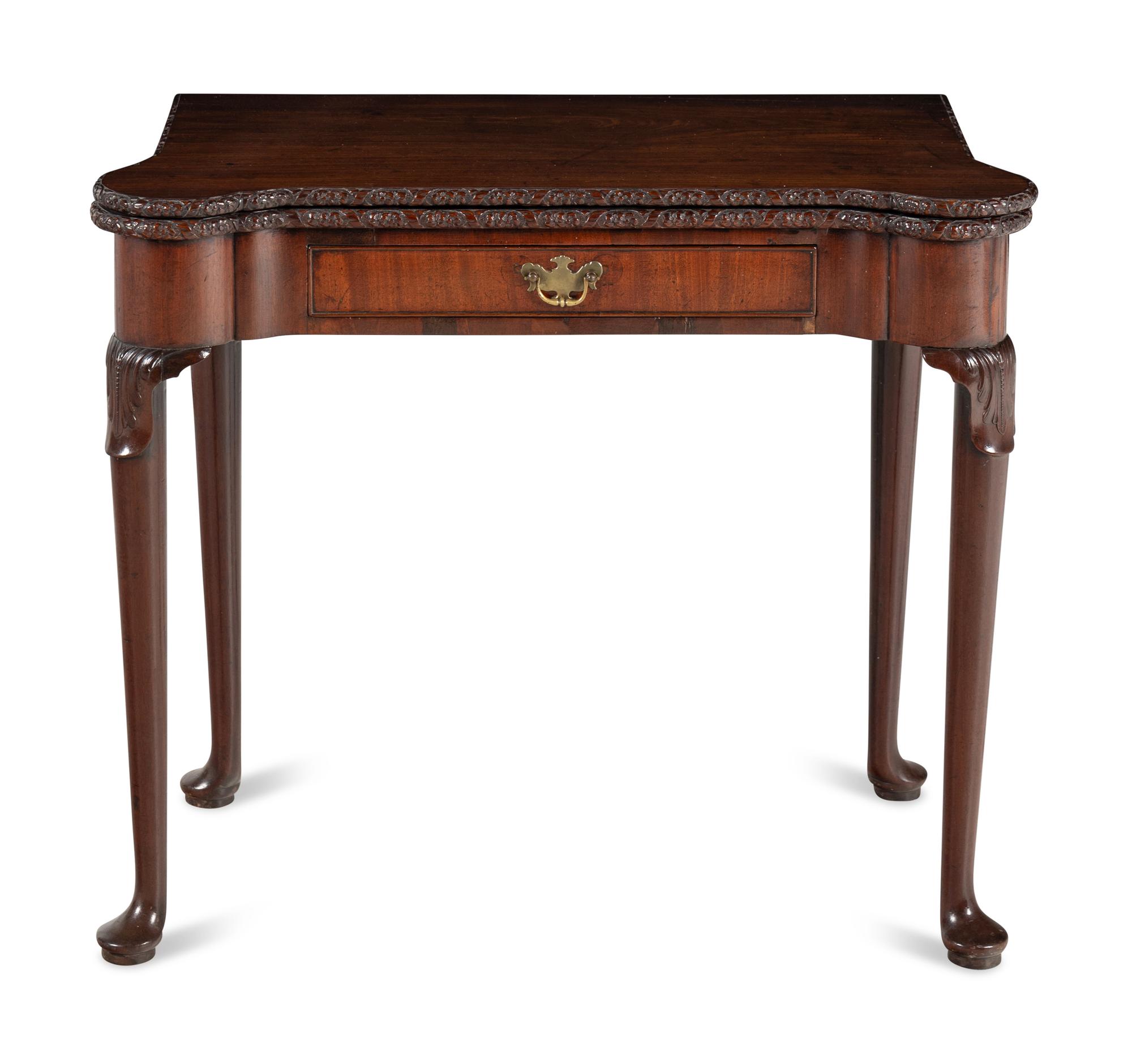 A George III Carved Mahogany Flip-Top Table