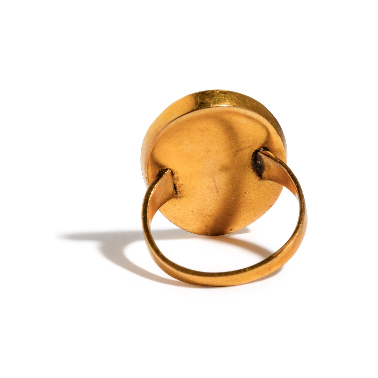 A Neoclassical Gold and Onyx Cameo Finger Ring with a Bacchic Scene
