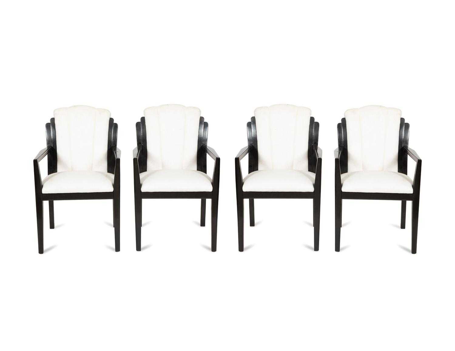 A Set of Four Art Deco Style Ebonized Open Armchairs