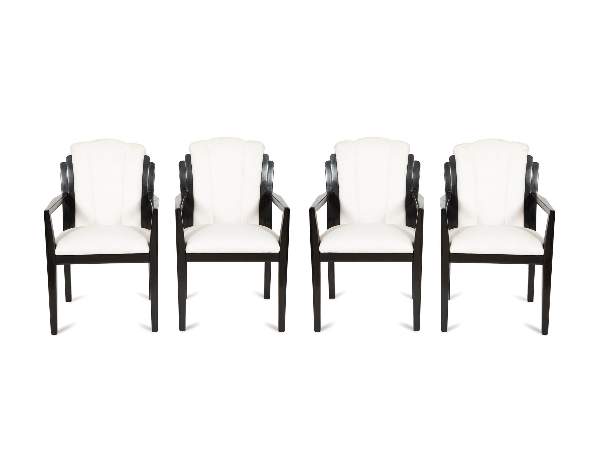 A Set of Four Art Deco Style Ebonized Open Armchairs