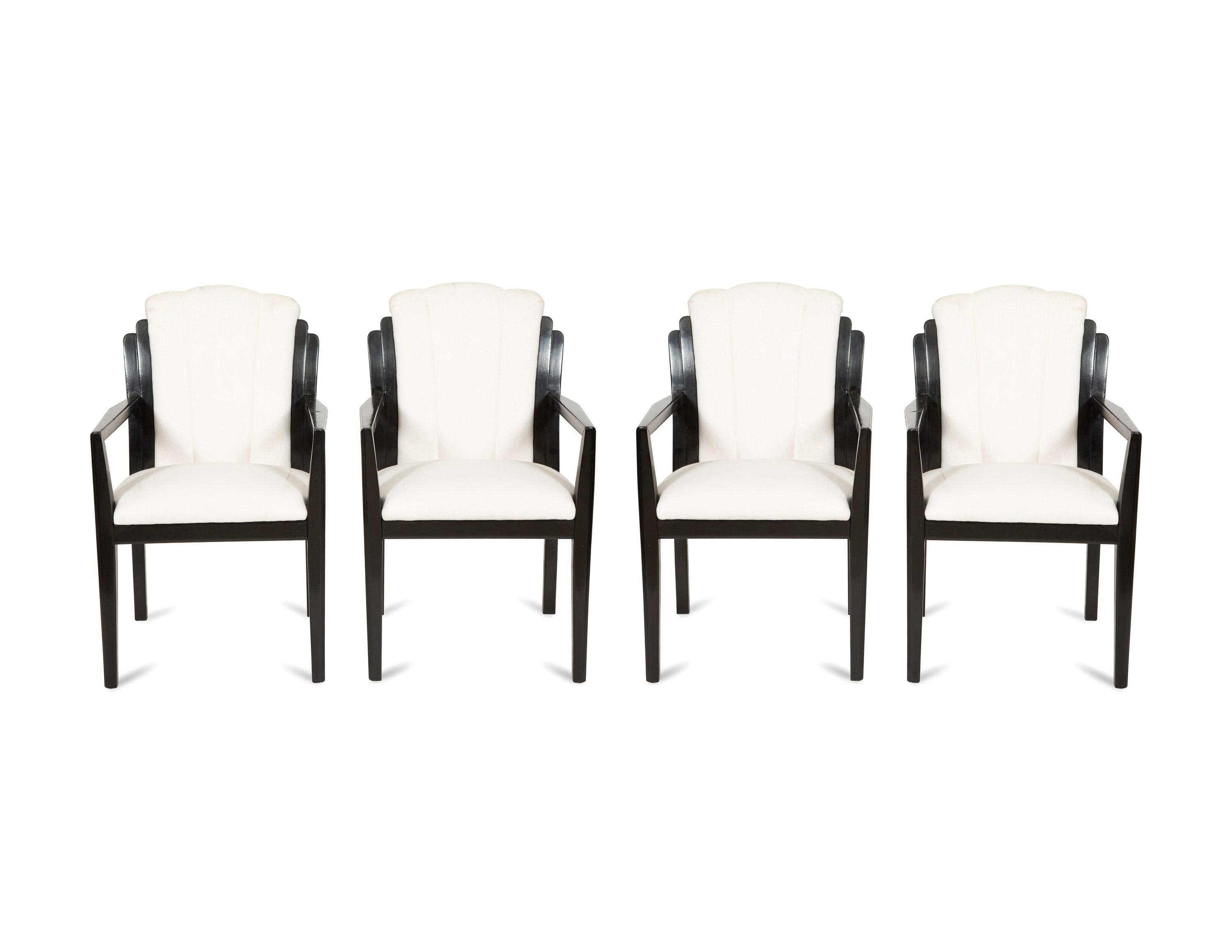 A Set of Four Art Deco Style Ebonized Open Armchairs