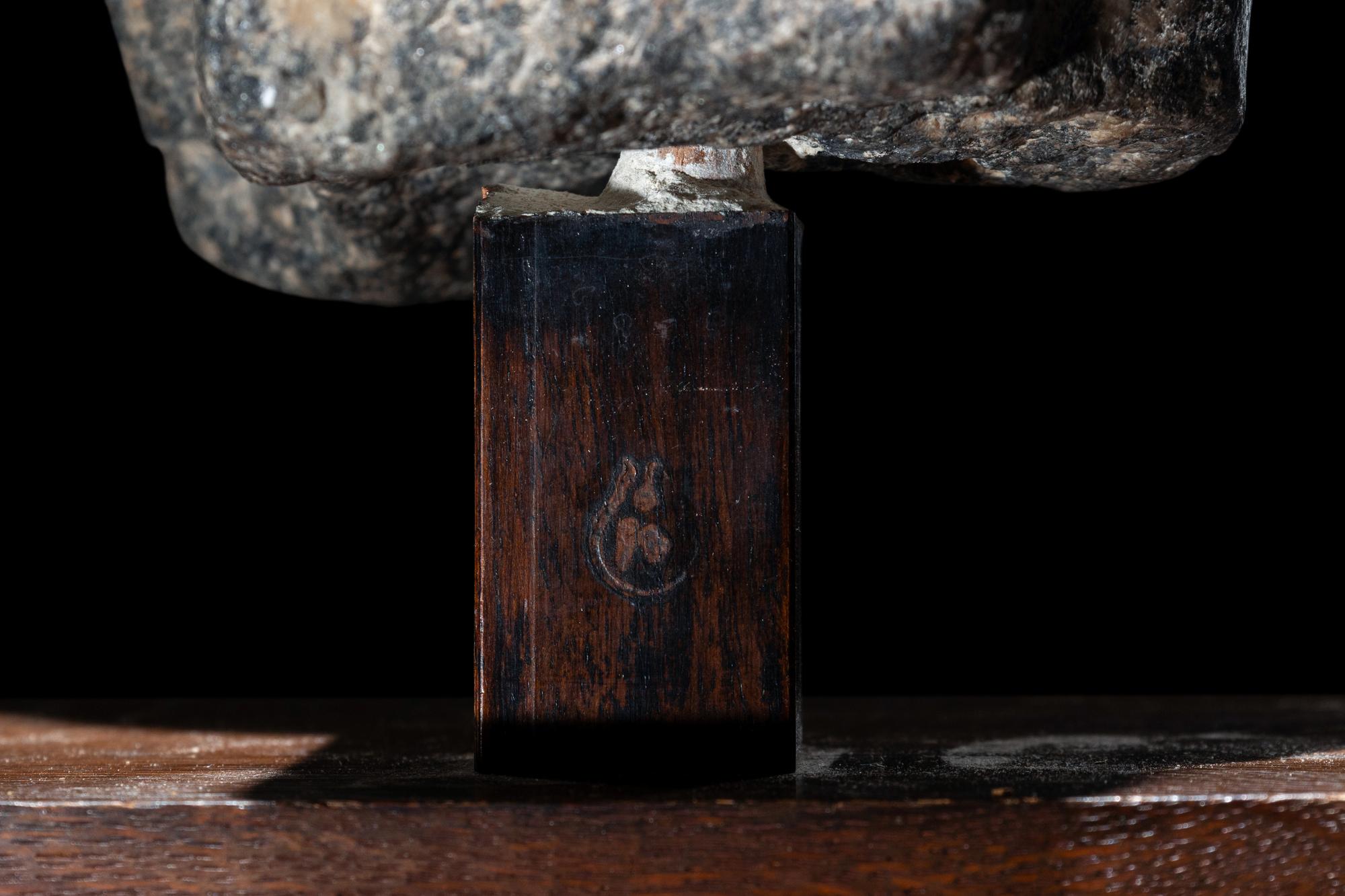 An Egyptian Granite Torso of an Official
